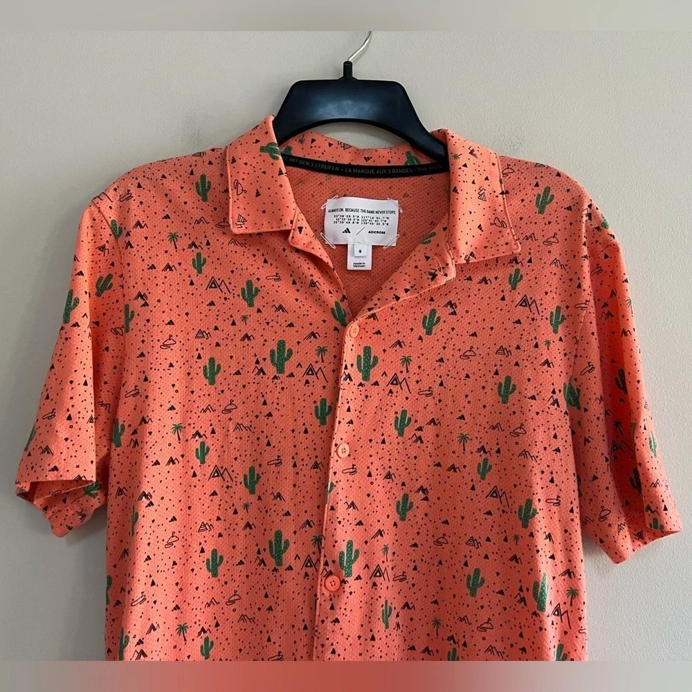 Adidas Adicross Golf Desert Button Up Short Sleeve Shirt in Coral Fusion, size S